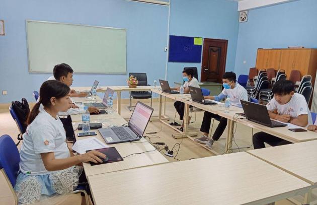 A teacher being filmed at Hun Senkov high school in Kang Meas District in Kampong Cham province, Cambodia, which welcomed students during stage 2 of school re-openings. 